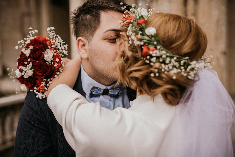 Couple sharing a kiss during their engagement photos session